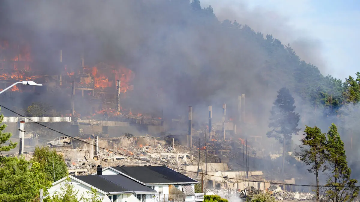 Large fire spreads through townhouse