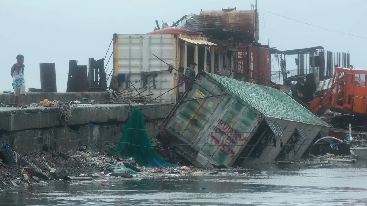Typhoon victims are exhumed in the Philippines