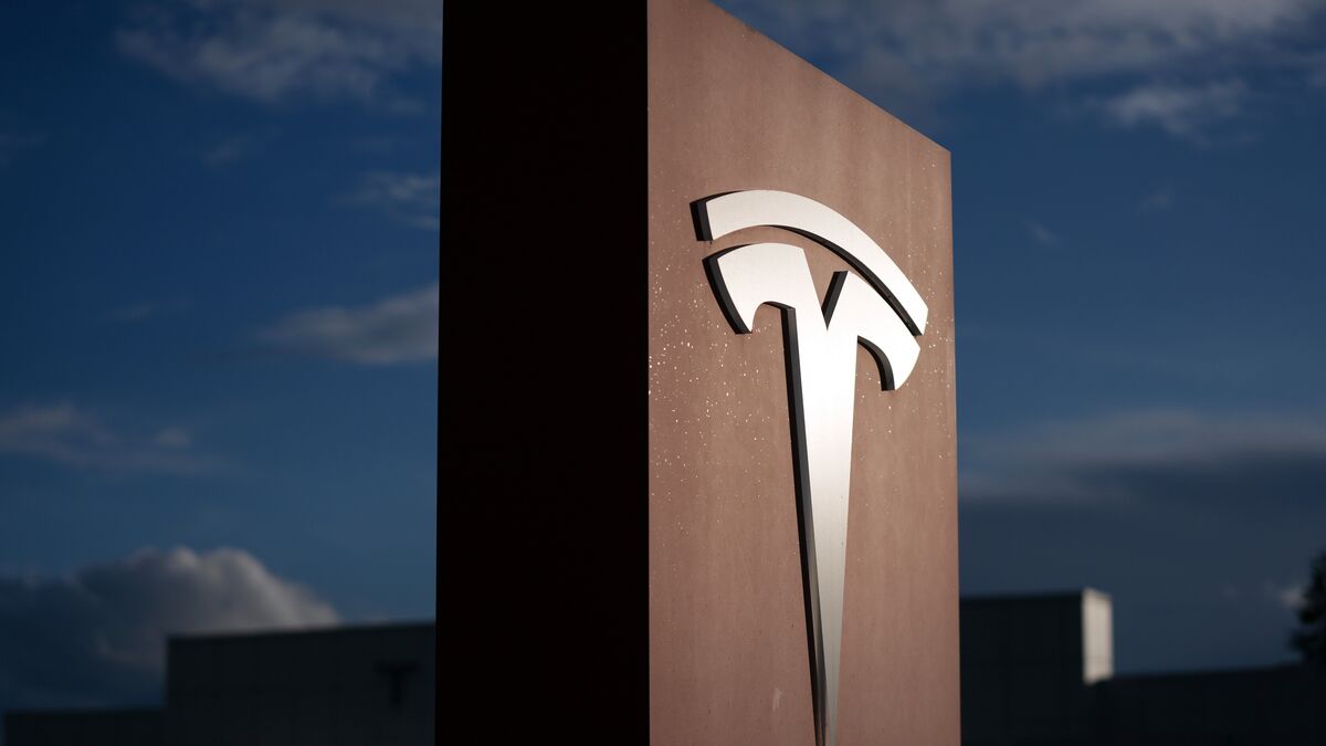 Tesla beats quarterly earnings and revenue expectations as shares rise after hours