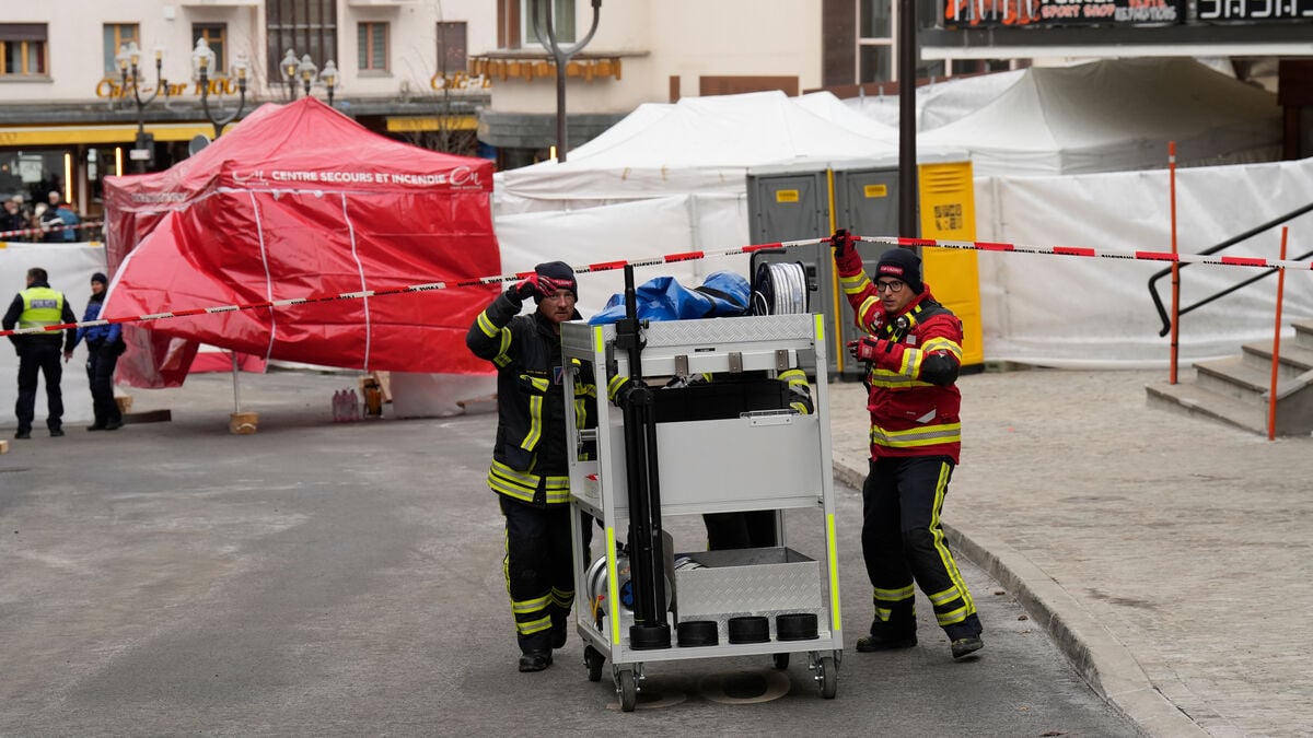 Bar owner says he found several people dead behind locked back door after New Year's Eve fire