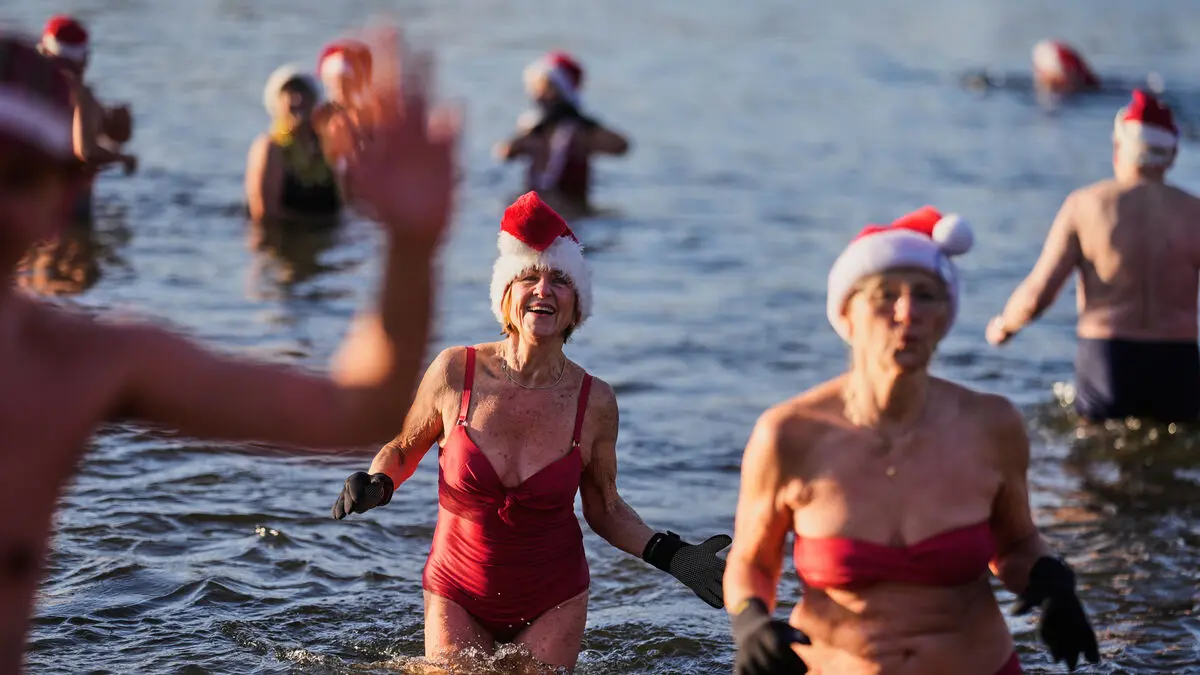 Traditional Christmas Day swim attracted many Europeans