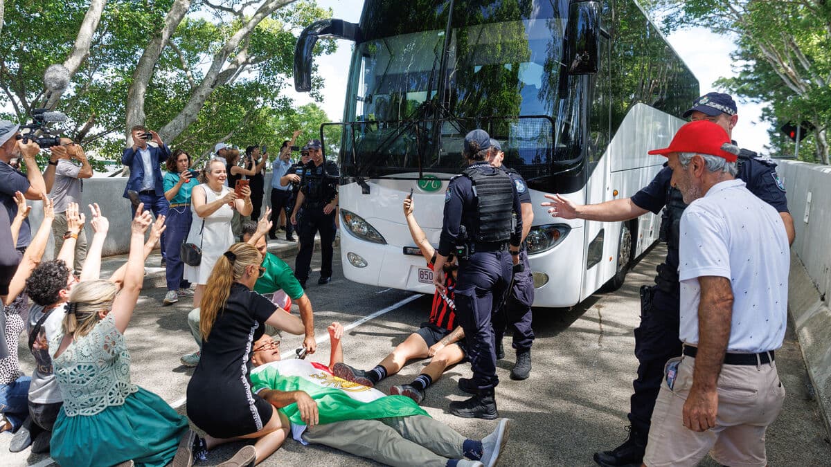 Protesters tried to stop Iran's women's national soccer team bus