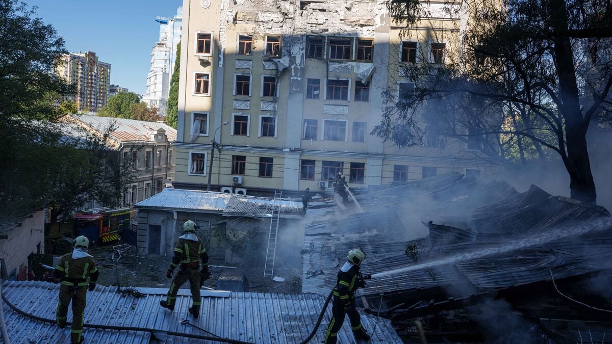 At least seven killed in Russian attack on Kyiv parking lot and office building