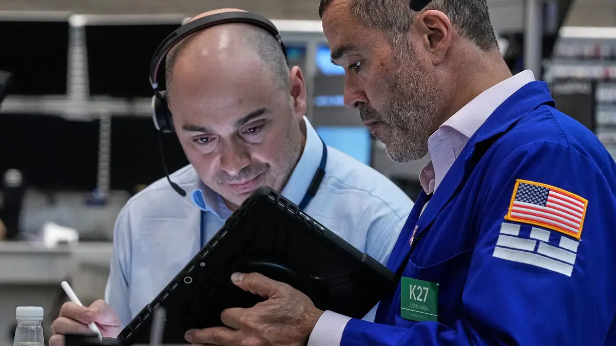 Wall Street rebounds after AI craze as Dow hits record and Broadcom tumbles