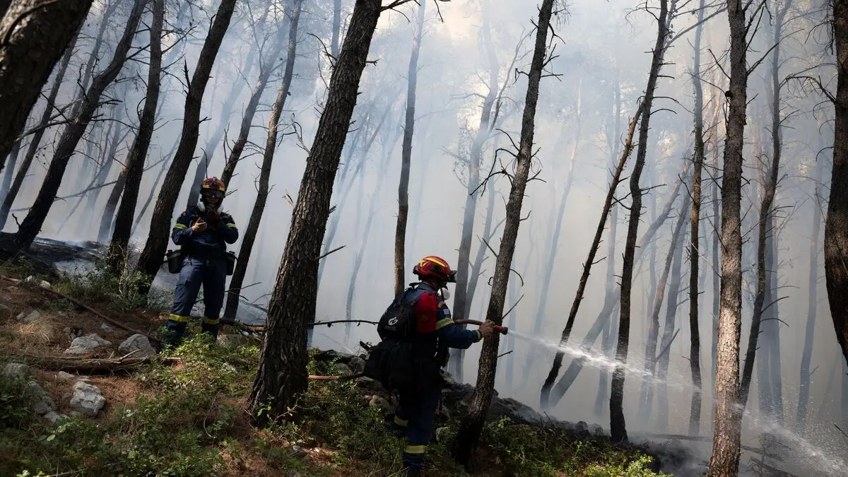 Hundreds of firefighters battle wildfire threatening Greek holiday resort near Athens