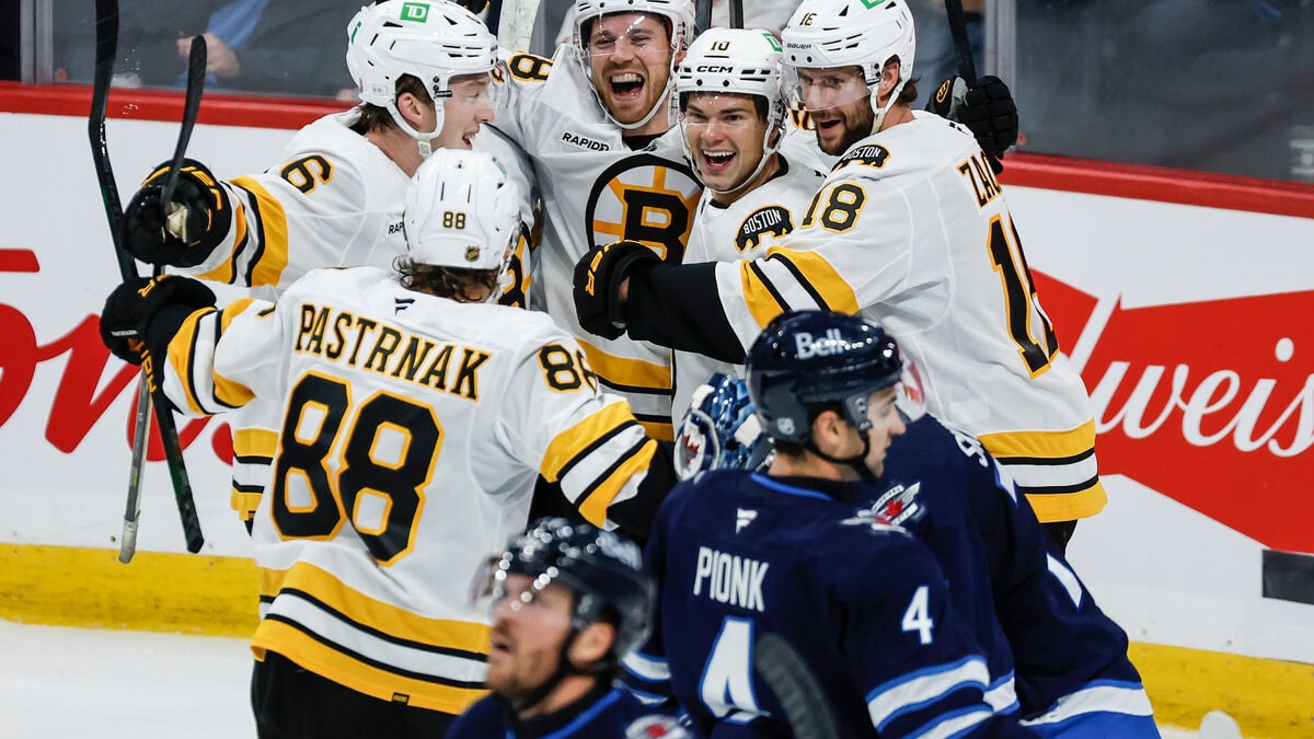 Hampus Lindholm and Elias Lindholm help Boston rally past Winnipeg 4-3