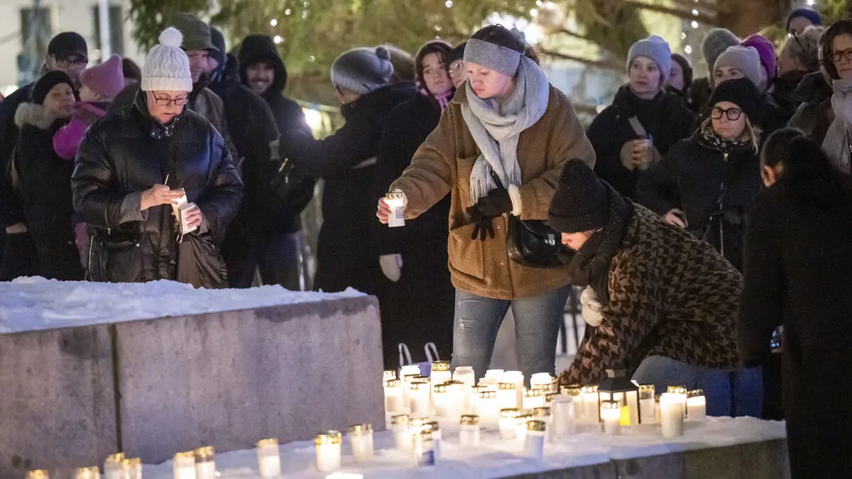 Murdered women honored at candlelight