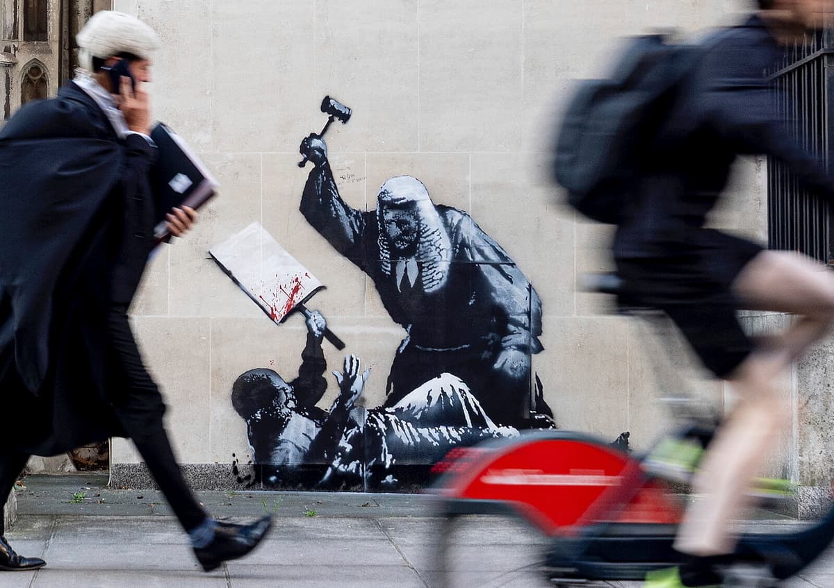 Banksy Unveils New Artwork Near London's Supreme Court After Protests