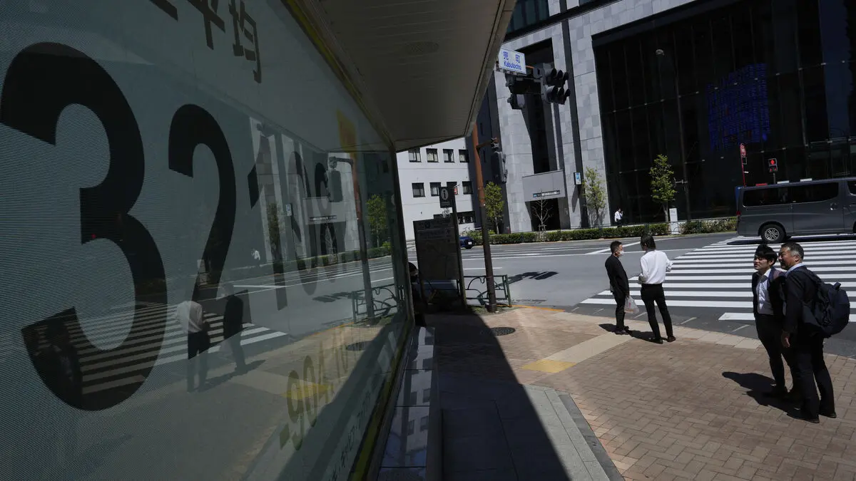 Stock markets in Asia turn downward as oil prices rise