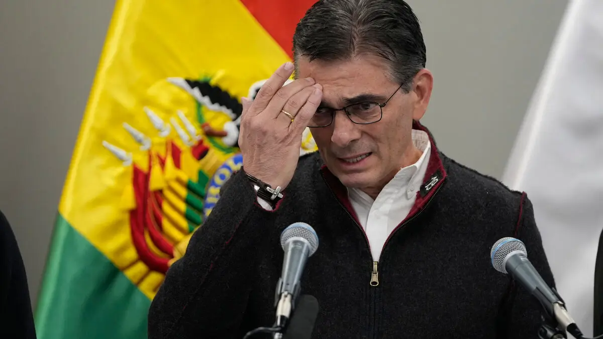 Bolivian president cuts his own salary in half amid weeks of protests