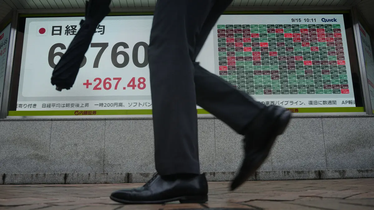 Asian stock markets calm after Fed raises interest rates