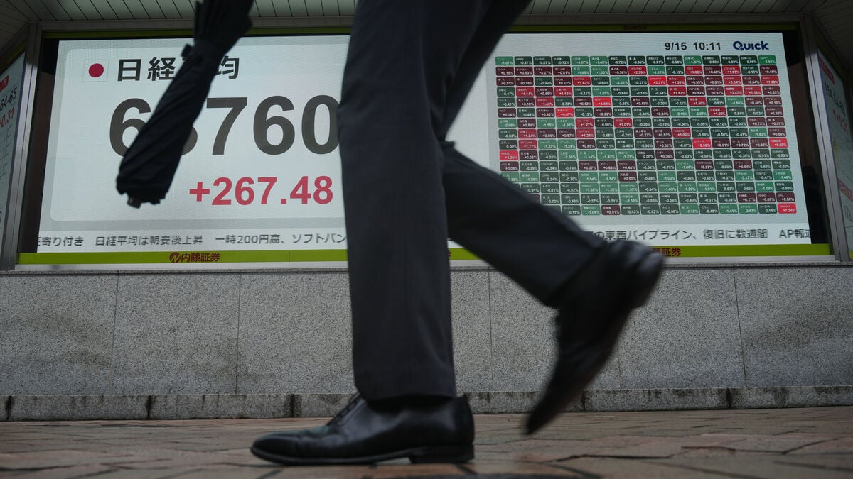 Asian stock markets calm after Fed raises interest rates