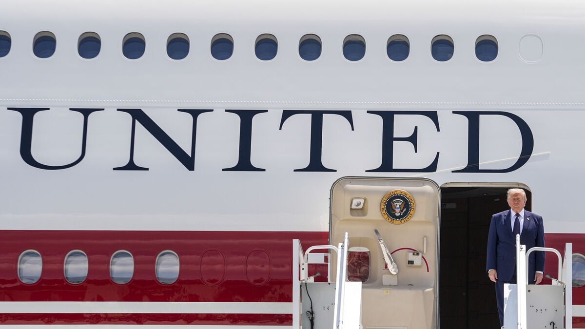 Trump administration backs down on New York Times reporters over Air Force One security story