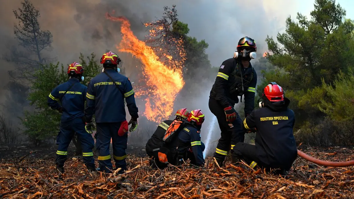 Wildfires spread closer to Athens as evacuations continue in Greece