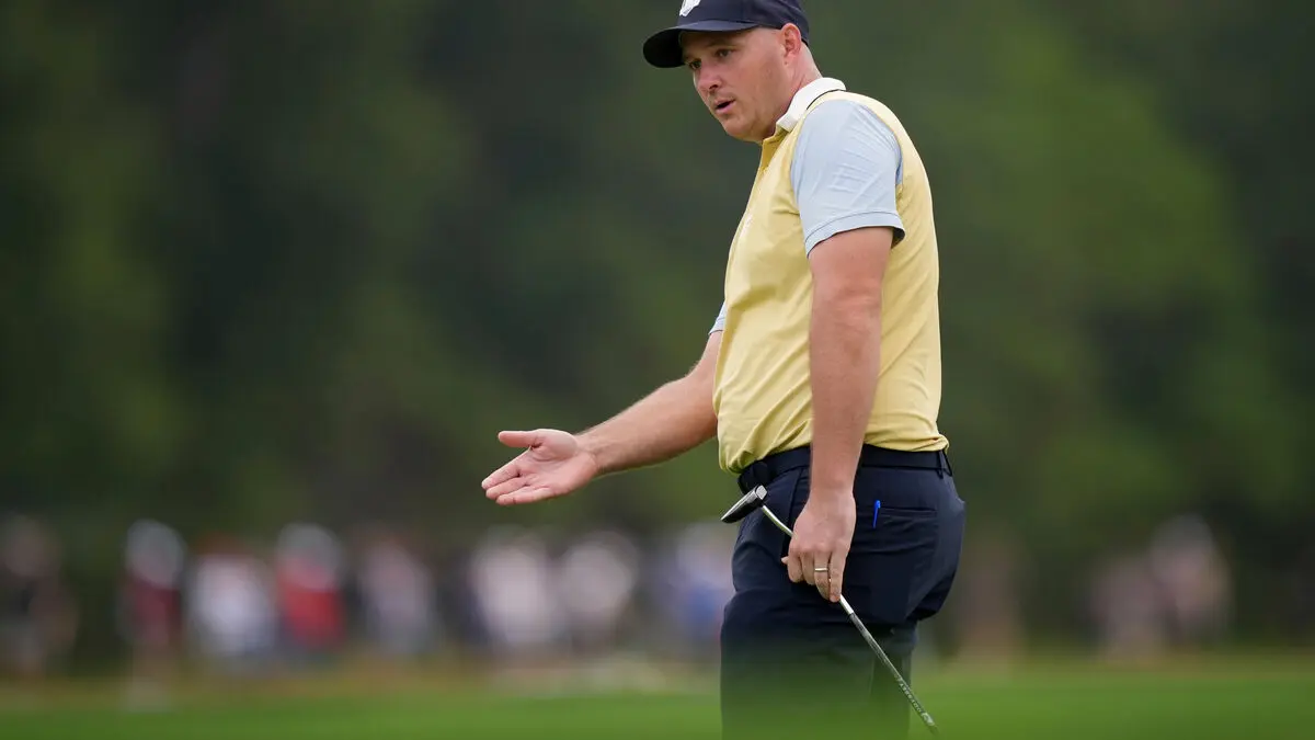 Golf star's happy news - dropping out of competition