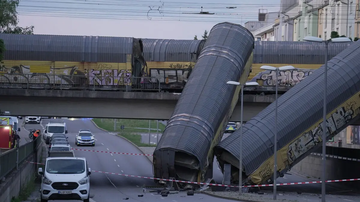 One dead after freight train collision on bridge in Munich