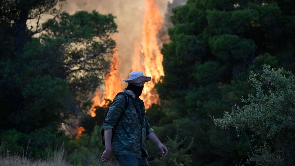 New fires threaten area around Athens as Greece battles worst blazes in a decade