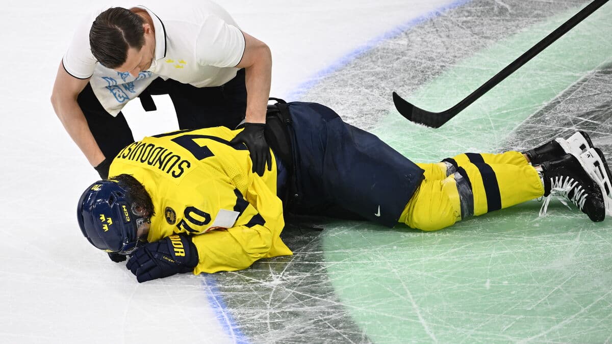 Sundqvist in wheelchair after hit,