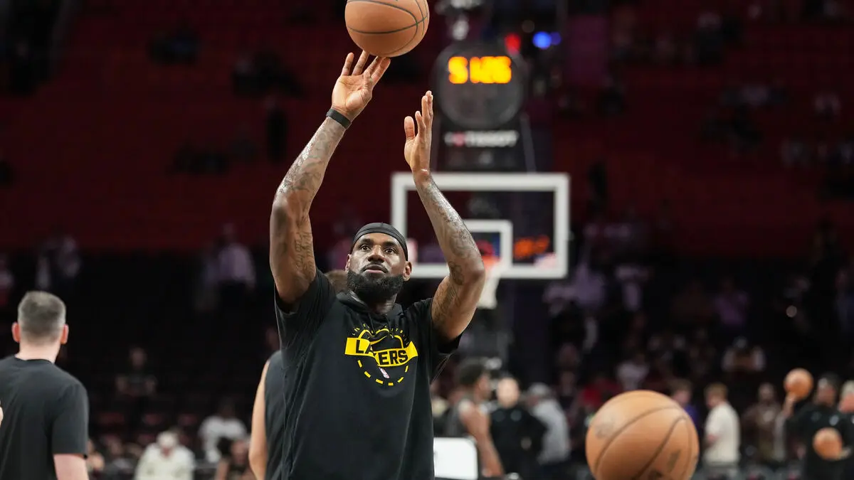 LeBron James ties NBA record for most games played