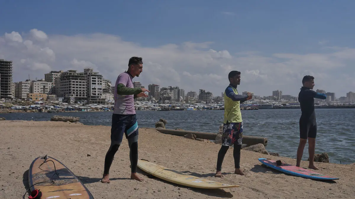 Palestinian surfers risk their lives to catch waves in Gaza
