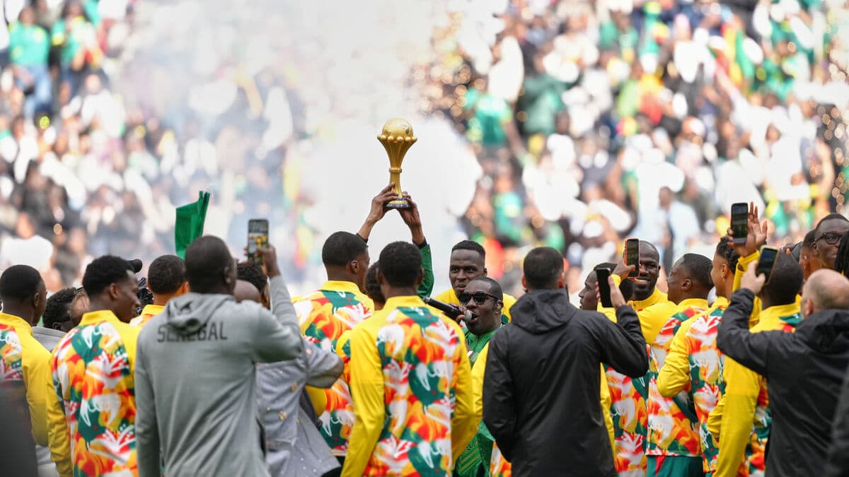 Senegal celebrates with their lost trophy