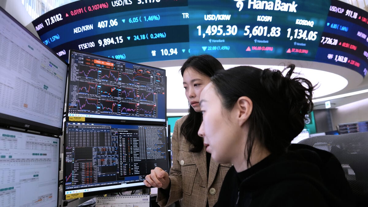 Stock markets in Asia open mixed as South Korea's Kospi falls 2.1 percent
