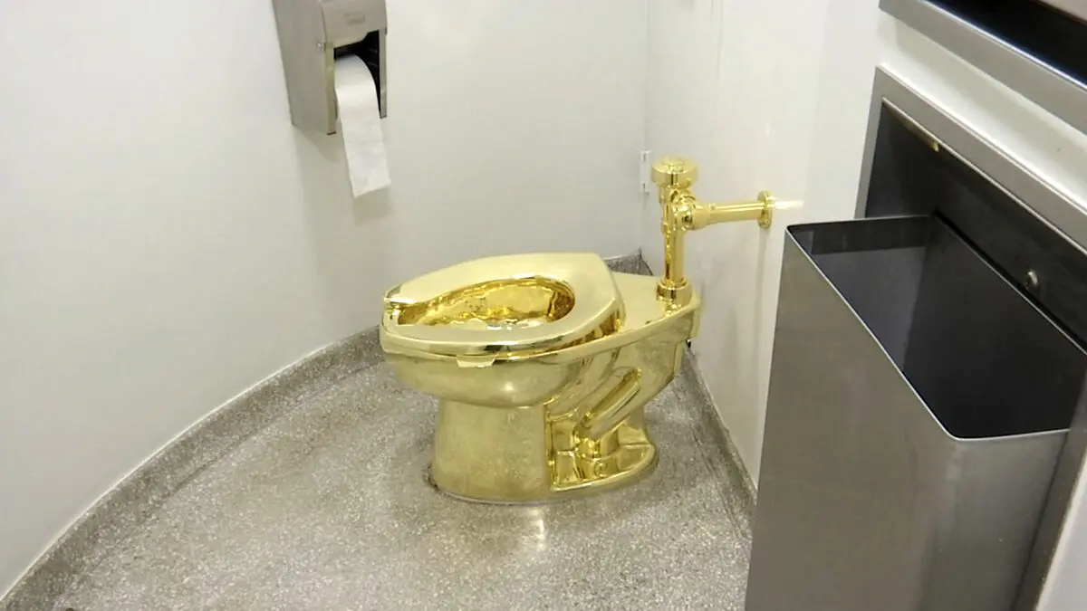 Gold toilet sold for 115 million kronor