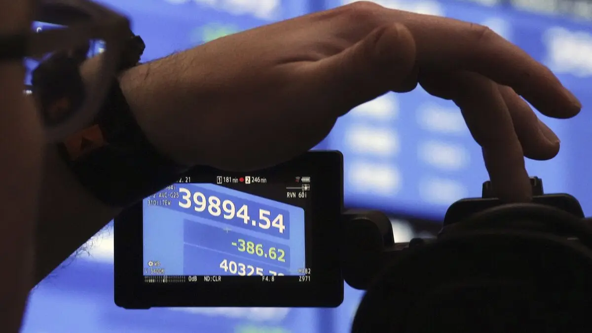 Up in Asia as Japan raises interest rates