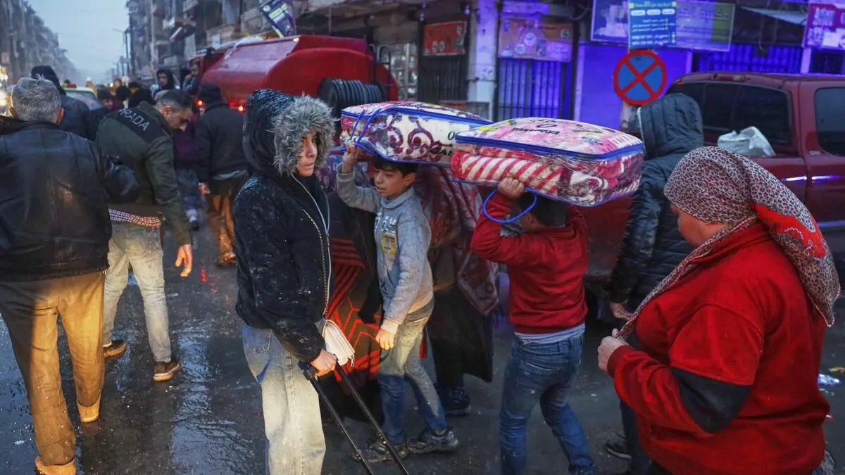 Syrian military urges Kurdish-led forces to leave area east of Aleppo