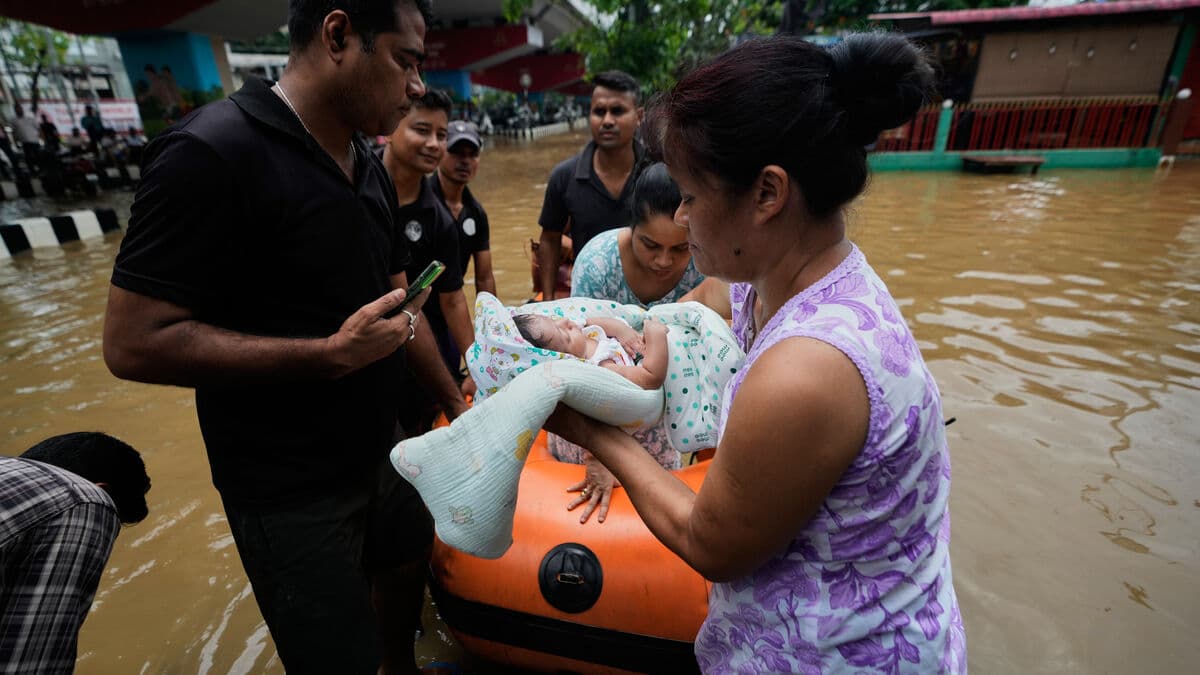 At least 50 dead and 700,000 displaced in India floods and landslides