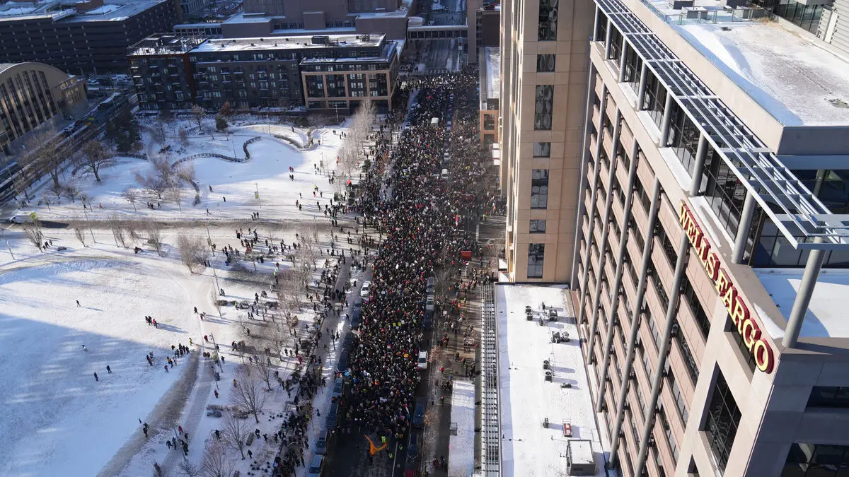 Thousands demonstrate in freezing Minnesota as about 100 priests arrested at airport