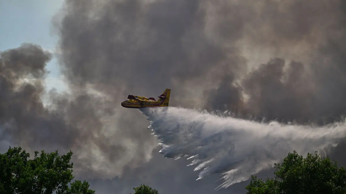 French wildfire near Paris still not under control after burning nearly 2,000 hectares