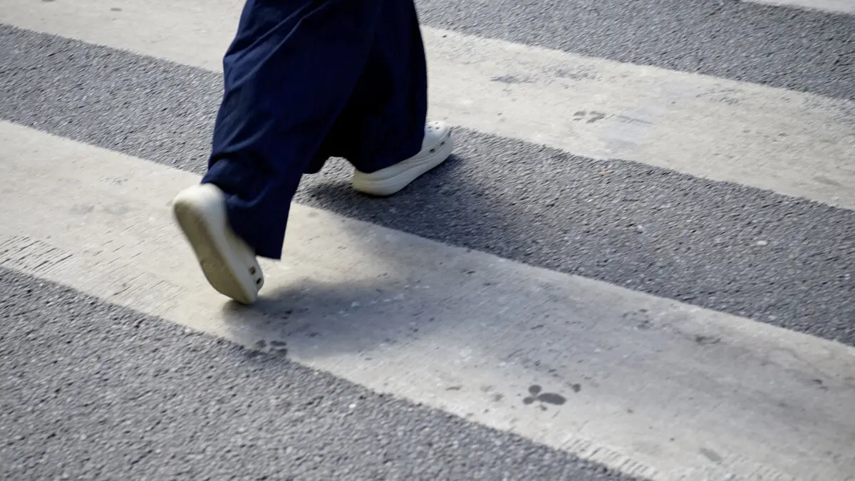 Looked at her phone - ran over a man and killed him