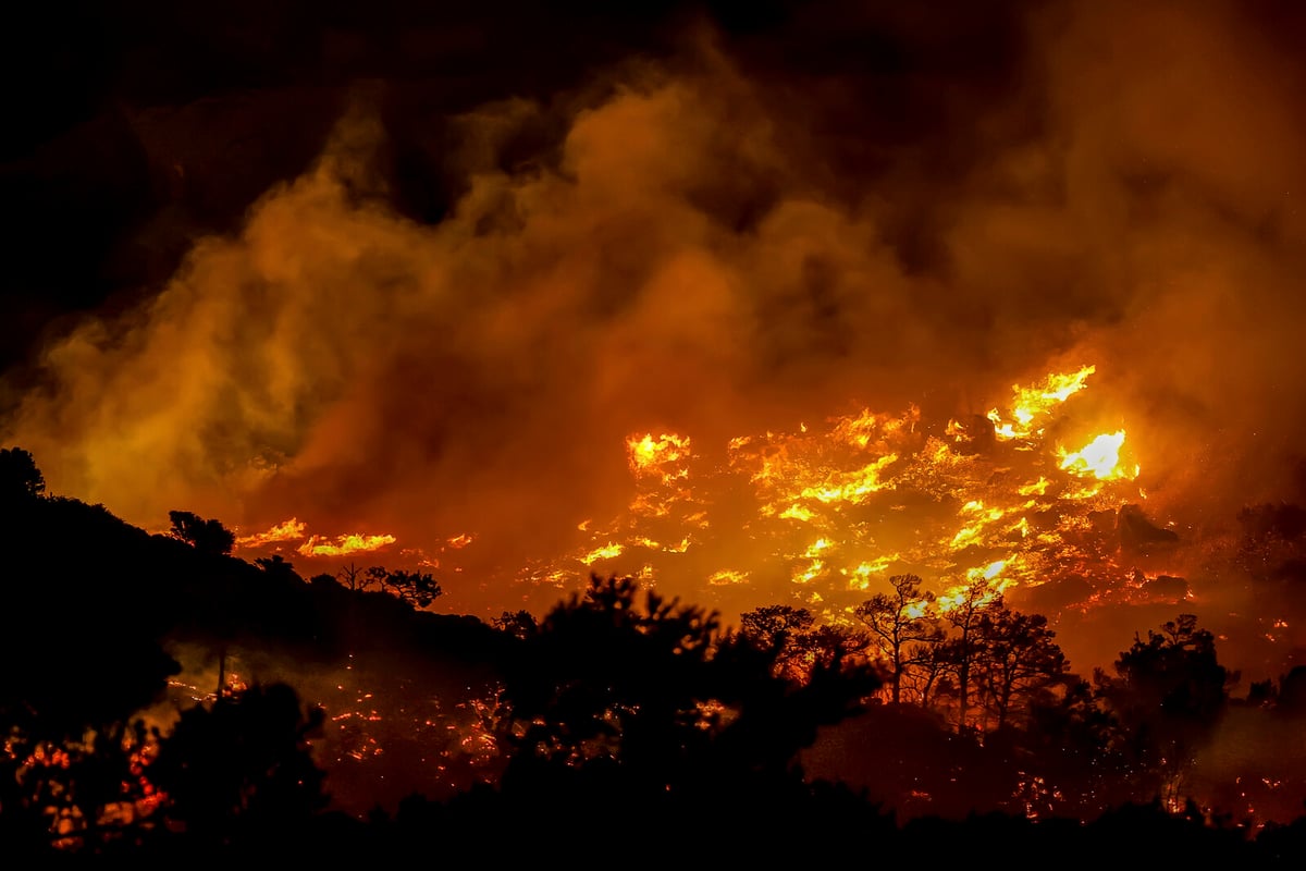 Crete Fire Eases as Evacuations Continue