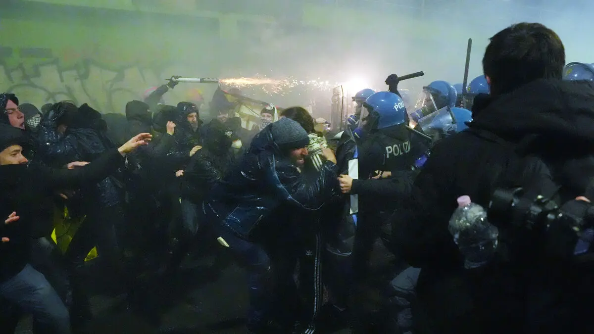 Police fire tear gas and water cannon at ICE protesters in Milan during protests against the Olympics