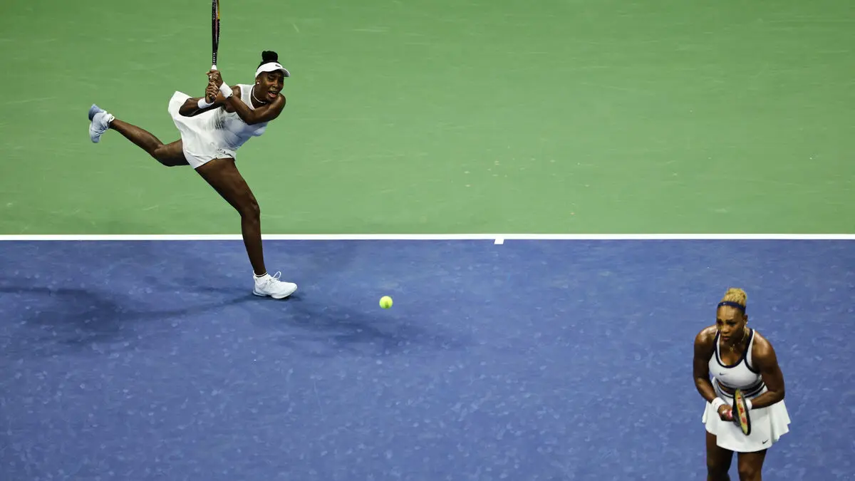 Williams sisters knocked out in US Open doubles first round after comeback attempt