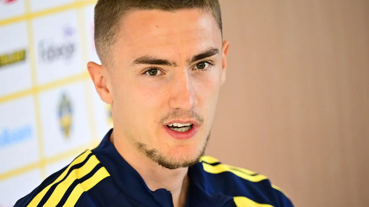 National team trio on the beach discussing life issues