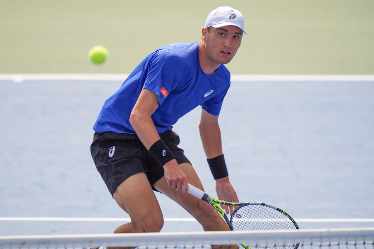 Belgium Nears Upset Against Australia in Davis Cup Tennis