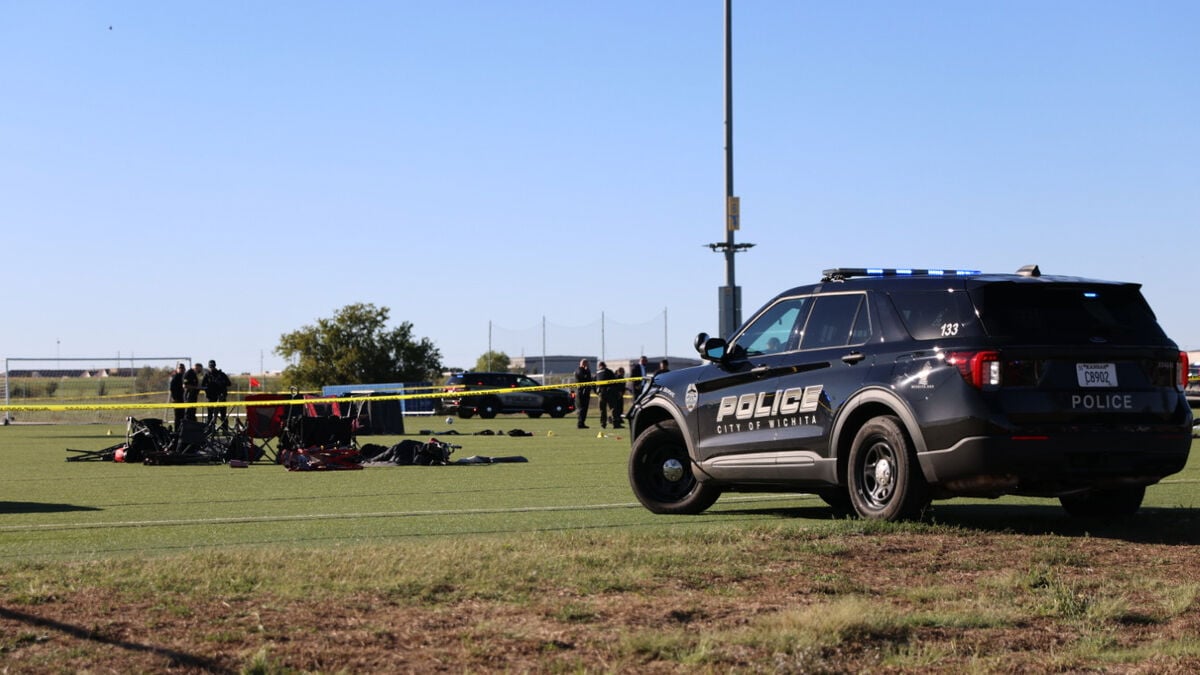 Man and child killed, 11 injured after car crashes onto Wichita football field during game