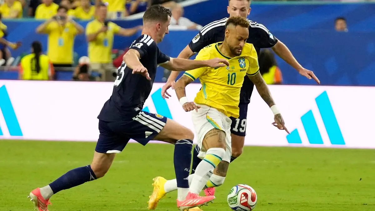 Brazil wins Group C after Neymar's debut