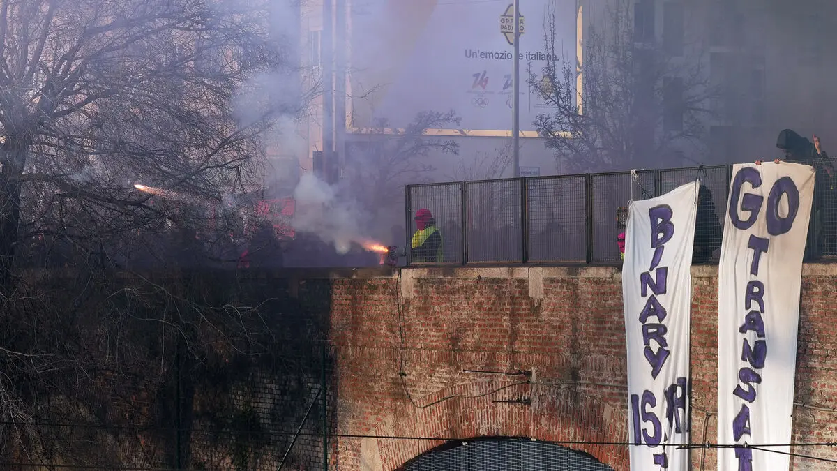 Olympic protesters threw rocks at police in Milan after the opening ceremony