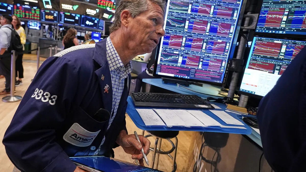 Wall Street rises as chip stocks rally after holiday weekend