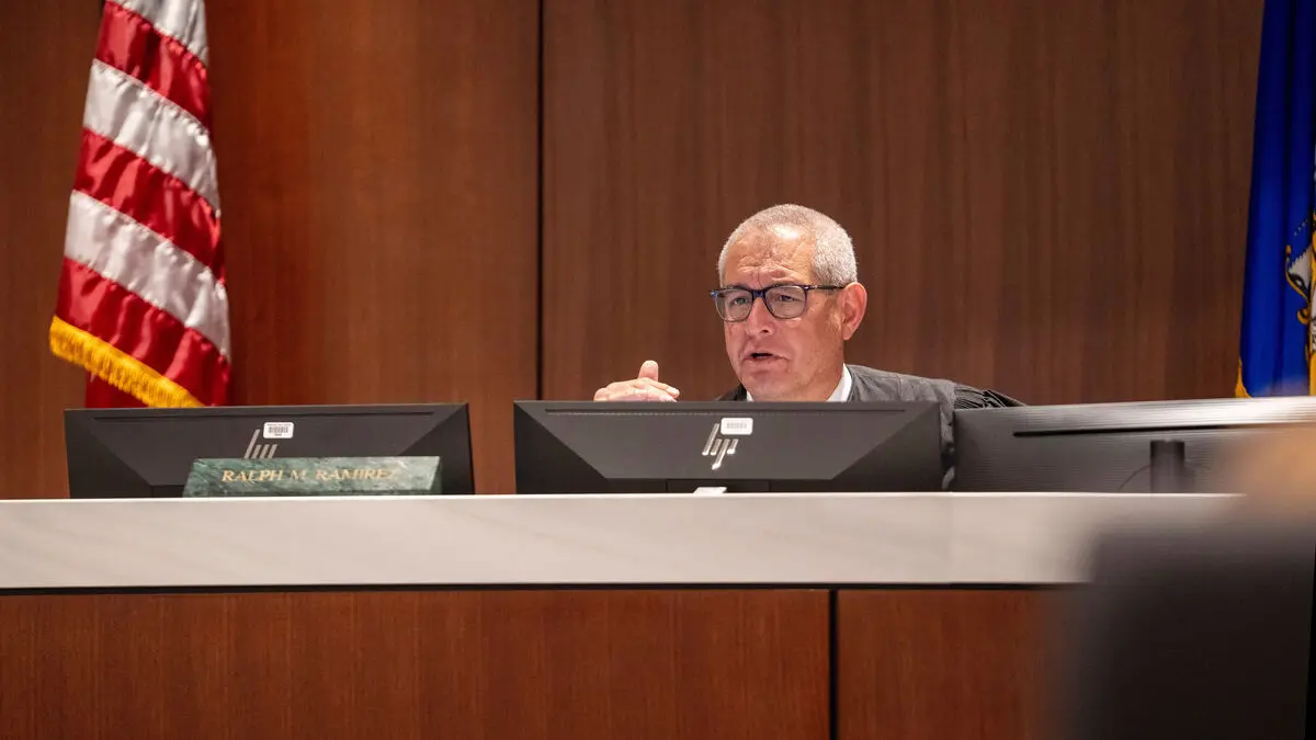 18-year-old accused of murdering his parents to finance an assassination plot against Trump