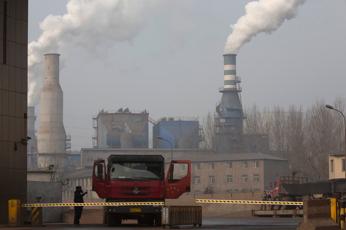 China's Emission Reduction Pledge Criticized as Vague and Unambitious