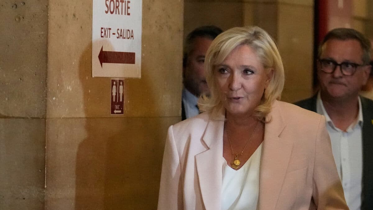 Marine Le Pen says she will run for president after court ruling clears way for candidacy