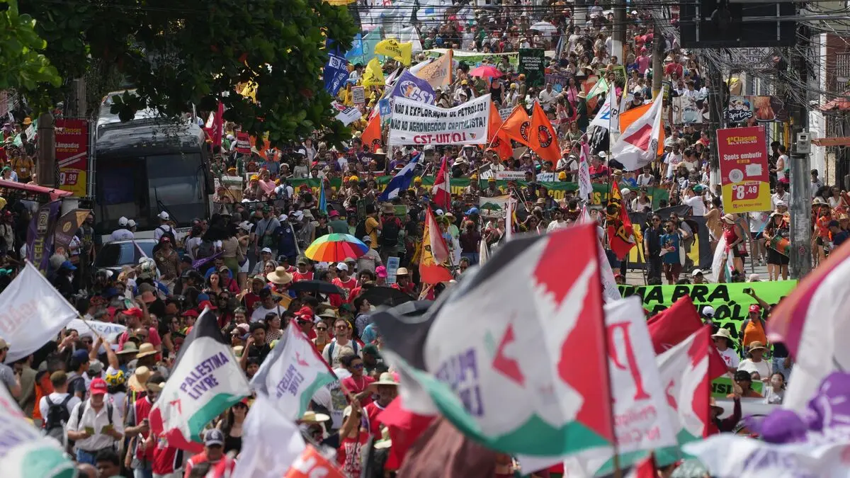 Large protest march takes place at climate meeting