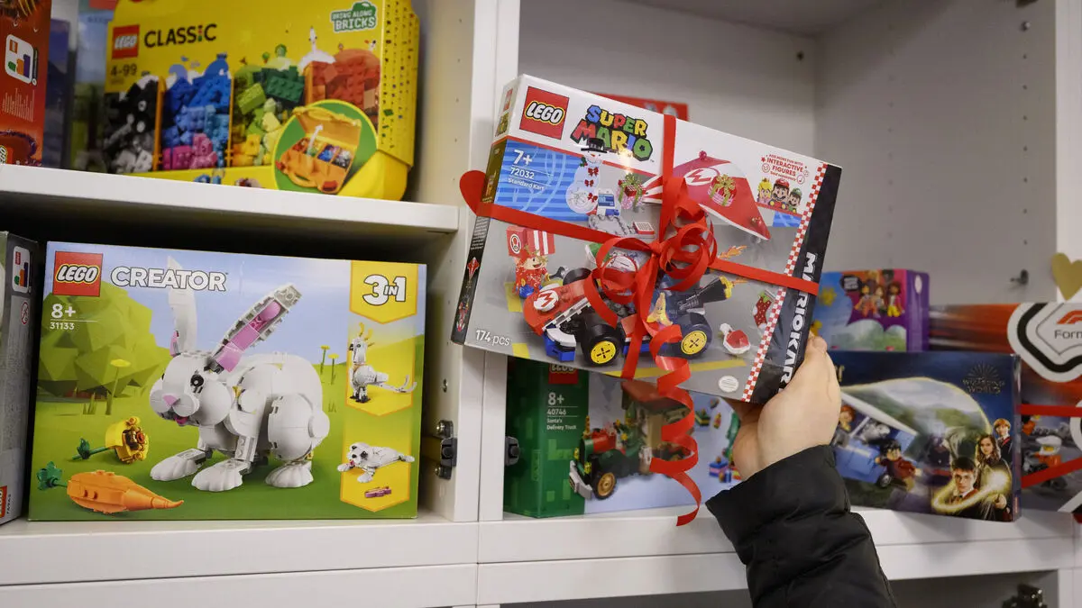 Here, families can pick up three Christmas presents per child.