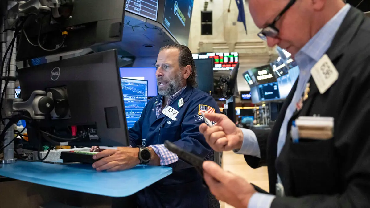 Strong jobs report sends Wall Street lower as rate hike bets rise