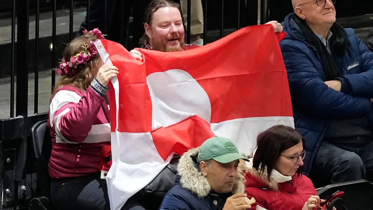 Fans held up the Greenlandic flag during USA-Denmark hockey game