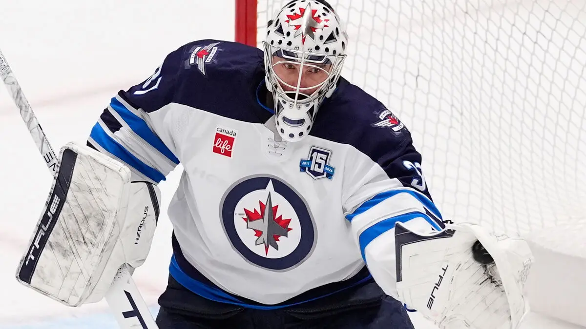 Olympic hero Connor Hellebuyck suspended after missing Winnipeg Jets camp